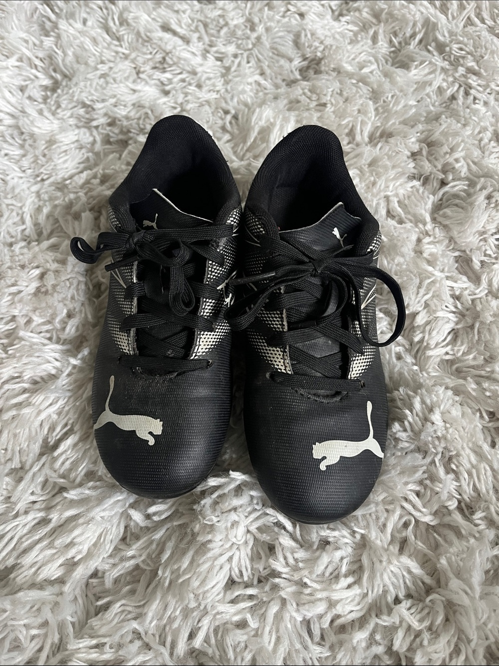 Puma Kids Black Soccer Cleats with White Logo